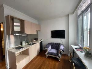 Køkken eller tekøkken på 36 club st residence