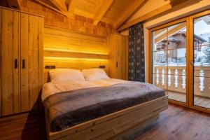 Postel nebo postele na pokoji v ubytování Falkensteinalm Top 1