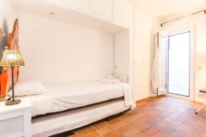 Ένα ή περισσότερα κρεβάτια σε δωμάτιο στο Penelope Apart