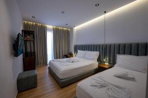 Postel nebo postele na pokoji v ubytování Hotel Siars