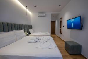 Postel nebo postele na pokoji v ubytování Hotel Siars