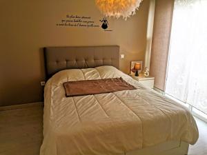 Postel nebo postele na pokoji v ubytování Le Patio Celeste