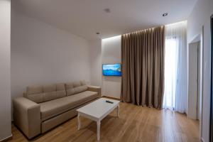 TV a/nebo společenská místnost v ubytování Hotel Siars + 37 fotografií