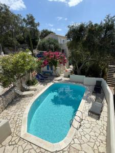 Bazén v ubytování Margarita Apartments Paxos - Studio Illa nebo v jeho okolí