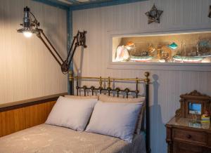 A bed or beds in a room at Container Luxury House