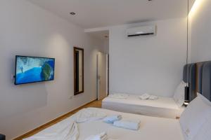 Postel nebo postele na pokoji v ubytování Hotel Siars