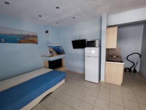 TV a/nebo společenská místnost v ubytování Seaside house