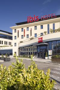 a building with ahs hotel on top of it at Ibis Valladolid in Valladolid
