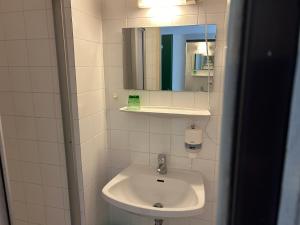 Koupelna v ubytování ''Am Limes'' Hotel