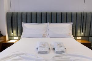 Postel nebo postele na pokoji v ubytování Hotel Siars