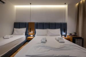 Postel nebo postele na pokoji v ubytování Hotel Siars