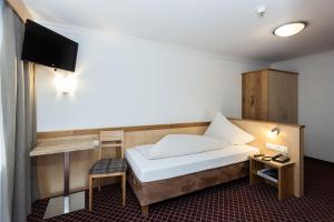 Posteľ alebo postele v izbe v ubytovaní Hotel Garni Ehrenreich