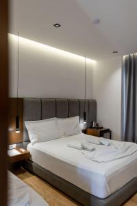 Postel nebo postele na pokoji v ubytování Hotel Siars