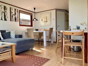 Posezení v ubytování Haus Sonnenschein mit Blick auf das Lauwersmeer