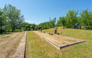 A garden outside 2 Bedroom Beautiful Apartment In Poppi