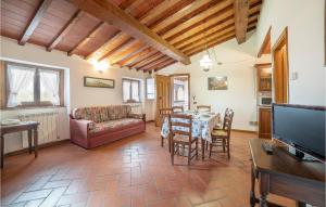 A television and/or entertainment centre at 2 Bedroom Beautiful Apartment In Poppi