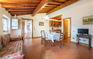 A television and/or entertainment centre at 2 Bedroom Beautiful Apartment In Poppi