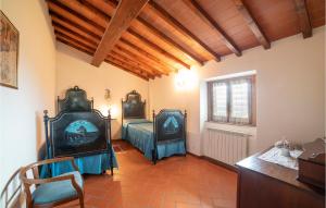 A seating area at 2 Bedroom Beautiful Apartment In Poppi