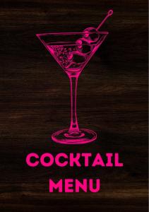 a pink martini glass with a martini at Skegness Town Centre Apartment 2 in Skegness +2 photos
