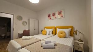 En eller flere senge i et værelse på Apartment Leilani & Karolina