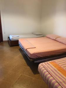 Een bed of bedden in een kamer bij Casa San Vito