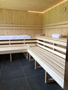 Postel nebo postele na pokoji v ubytování Das Schwarzwaldhotel