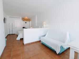 Postel nebo postele na pokoji v ubytování Hostal del Cabo