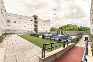 a swimming pool on the roof of a building at Apartment 25 with free parking and pool in Bormujos