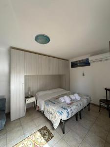 A bed or beds in a room at Villa Orizzonte
