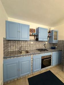 A kitchen or kitchenette at Villa Orizzonte