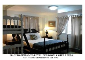 Postel nebo postele na pokoji v ubytování Agreeable Family Baguio Suites