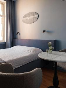 Postel nebo postele na pokoji v ubytování MIRO Rooms Center - quiet chic, self check-in
