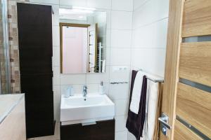 A bathroom at Apartment Primulka