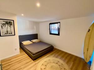 En eller flere senge i et værelse på TyKazKaf