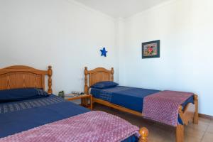 Posteľ alebo postele v izbe v ubytovaní NEW! APARTMENT HARMONIA, FRONT SEA VIEW, CALA MARSAL BEACH 300m