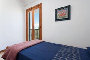 Posteľ alebo postele v izbe v ubytovaní NEW! APARTMENT HARMONIA, FRONT SEA VIEW, CALA MARSAL BEACH 300m
