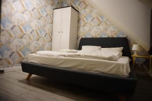 Posteľ alebo postele v izbe v ubytovaní Szczawnica Apartament C6