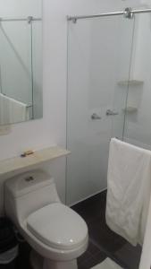 Koupelna v ubytování Hotel Casa Suite Curiti