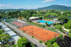 an overhead view of a tennis court with two courts at Camping Del Sole Village in Iseo