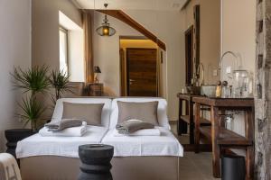 Postel nebo postele na pokoji v ubytování Kotnik Superior Boutique Hotel