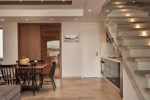 A kitchen or kitchenette at Beachfront Alassa Villas with Private Pools Még 37 kép
