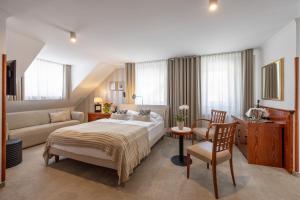 Postel nebo postele na pokoji v ubytování Kotnik Superior Boutique Hotel