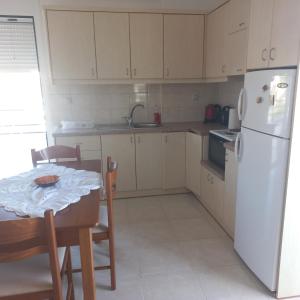 Kuchyň nebo kuchyňský kout v ubytování Central Rooms
