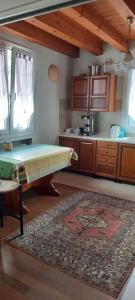 Kuchyň nebo kuchyňský kout v ubytování B&B Palmagrill