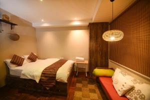 Giường trong phòng chung tại Mums Homestay & Studio Apartment-A Real Homestay Experience +63 ảnh