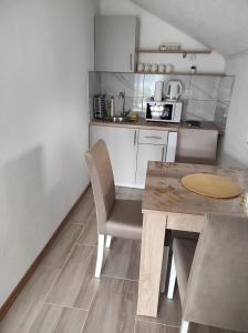 Η κουζίνα ή μικρή κουζίνα στο View of the city - Studio Apartment +21 φωτογραφίες