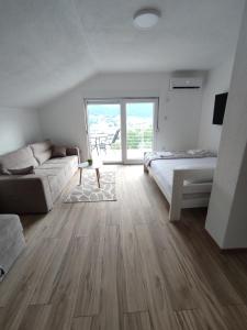 Ένα ή περισσότερα κρεβάτια σε δωμάτιο στο View of the city - Studio Apartment