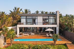 an image of a house with a swimming pool at Dolphin Coast YOLO Spaces - Beach House Villa in Ballito