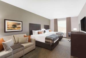 Wingate by Wyndham Hurricane Zion National Park客房内的一张或多张床位