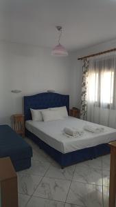Postel nebo postele na pokoji v ubytování Villa Karapataki